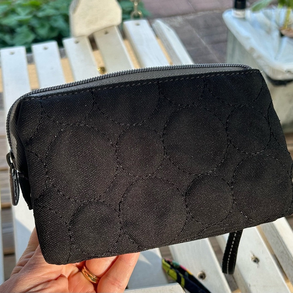 Black Quilted Vary You wallet by thirty-one